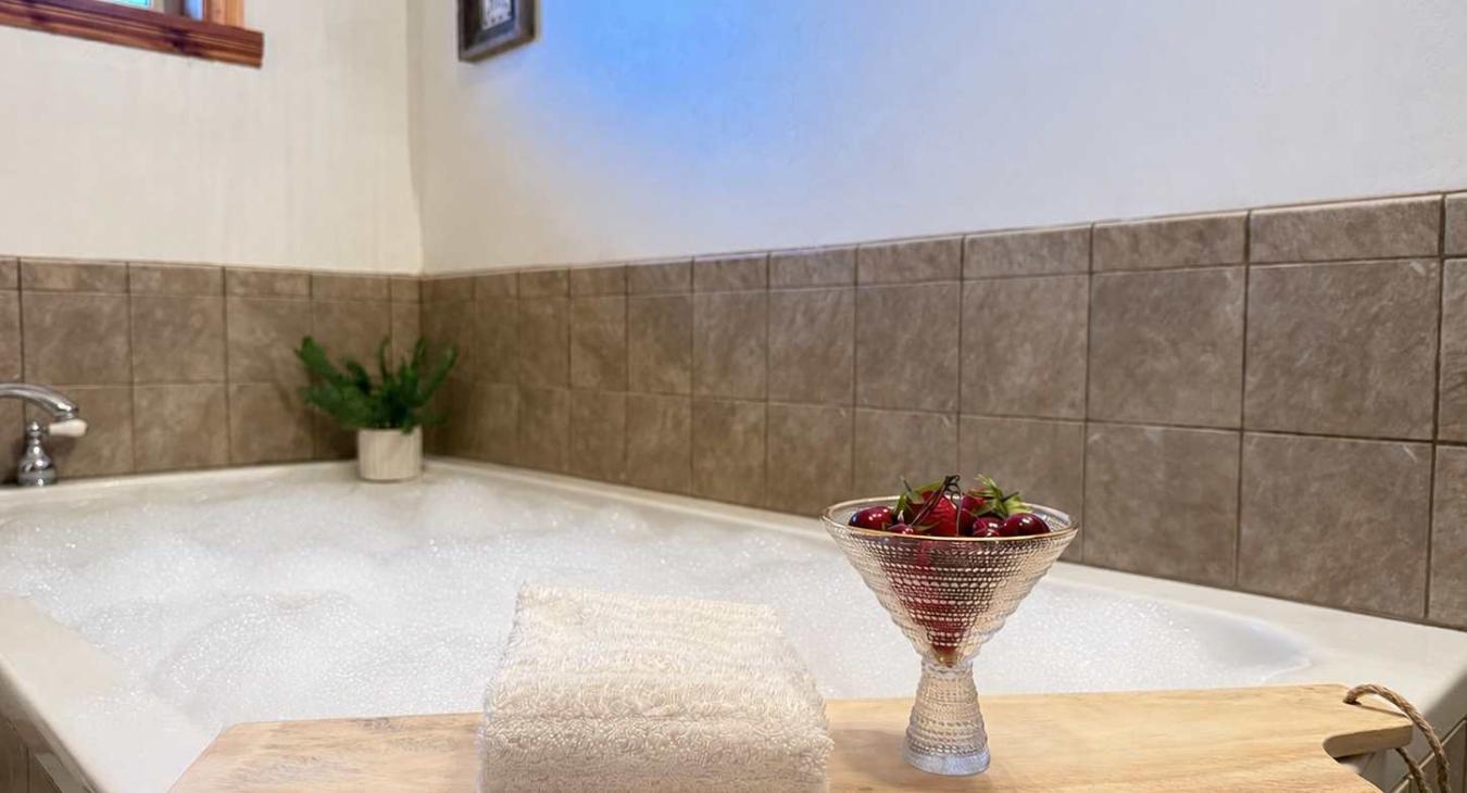 Relax in the master bath jetted tub.