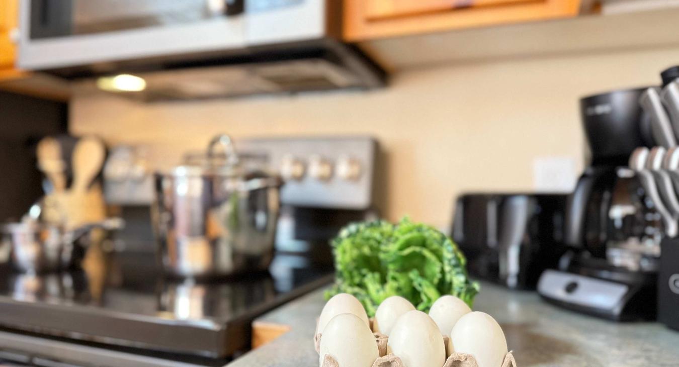 The openness of the kitchen makes it easy to chat with friends or family while cooking, or to catch the glow of the fire and the sound of laughter as you move between the rooms.