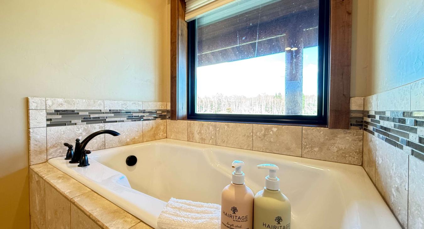 Soaking tub in the master bedroom.