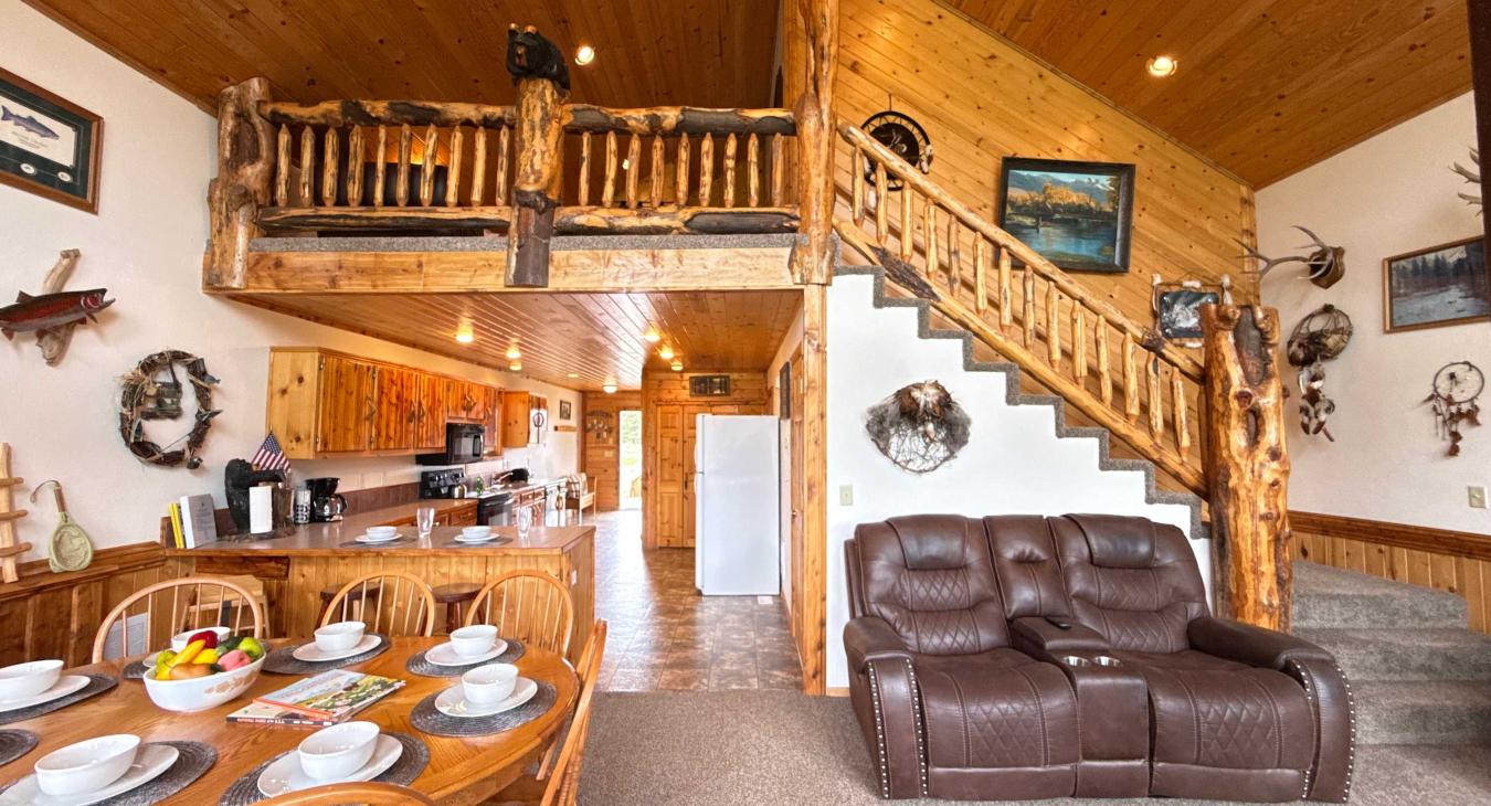Adjacent to the living room is the dining table and kitchen.