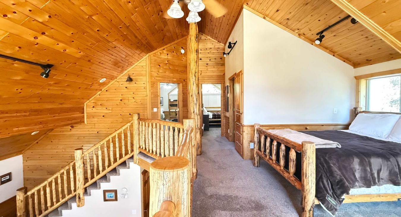 View from the loft to the bedrooms and stairs.