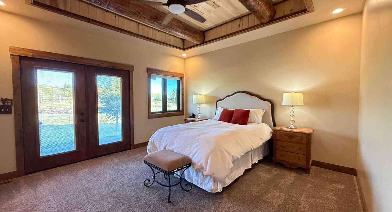 Master bedroom with a Queen size bed.