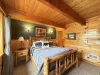 Downstairs bedroom with a queen bed.