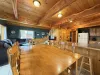 Dining area with plenty of seating. Comfortably seats 6 at the table and 2 at the bar.