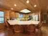 Kitchen located on the main floor. 6 bar stools on the island for additional seating.
