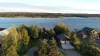 Beautiful view of the trees and water from the cabin.