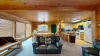 Main level living room with lots of seating.