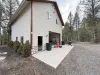 open garage with grill and firepit