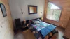 Bedroom #3 located upstairs on the second level with a Queen size bed.