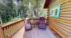 Outdoor deck area with chairs.