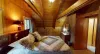Upstairs bedroom with a queen bed.