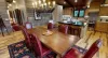Dining table seats 6 with extra seating at the kitchen island.
