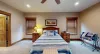 Main level master bedroom with a Queen size bed.
