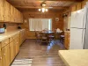 Large kitchen with additional dining table for 4