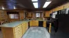 Kitchen comes equipped with a fridge, oven, microwave, and a dishwasher. It is also equipped with dishes, silverware, and basic cooking essentials.