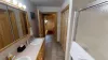 View from the bathroom looking towards the hallway.