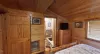 This bedroom is equipped with an ensuite shared bathroom.