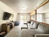 Full size couch upstairs to seat guests during your stay.
