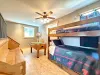 Let the games begin! This incredible space features a premium wooden foosball table right alongside the cozy bunk bed layout.