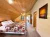 Upstairs loft with a queen bed.