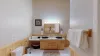 Beautiful vanity with great lighting to get ready for the day.