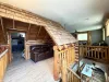 Overlooking the main floor, this versatile upstairs loft beautifully showcases the cabin's incredible log craftsmanship and open architectural design.