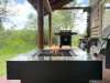 Cozy up around the premium propane gas fire pit table on the deck, providing a clean, warm fire at the flip of a switch.