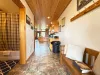 When you walk through the front door you are greeted by the front entry leading into the shared full bathroom and large kitchen.