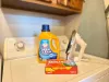 Laundry soap provided. Iron and ironing board.