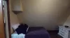 The third bedroom features a twin bed.