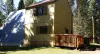 The deck is attached to the cabin with a grill for you to use.