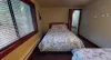 The master bedroom features 2 queen beds.